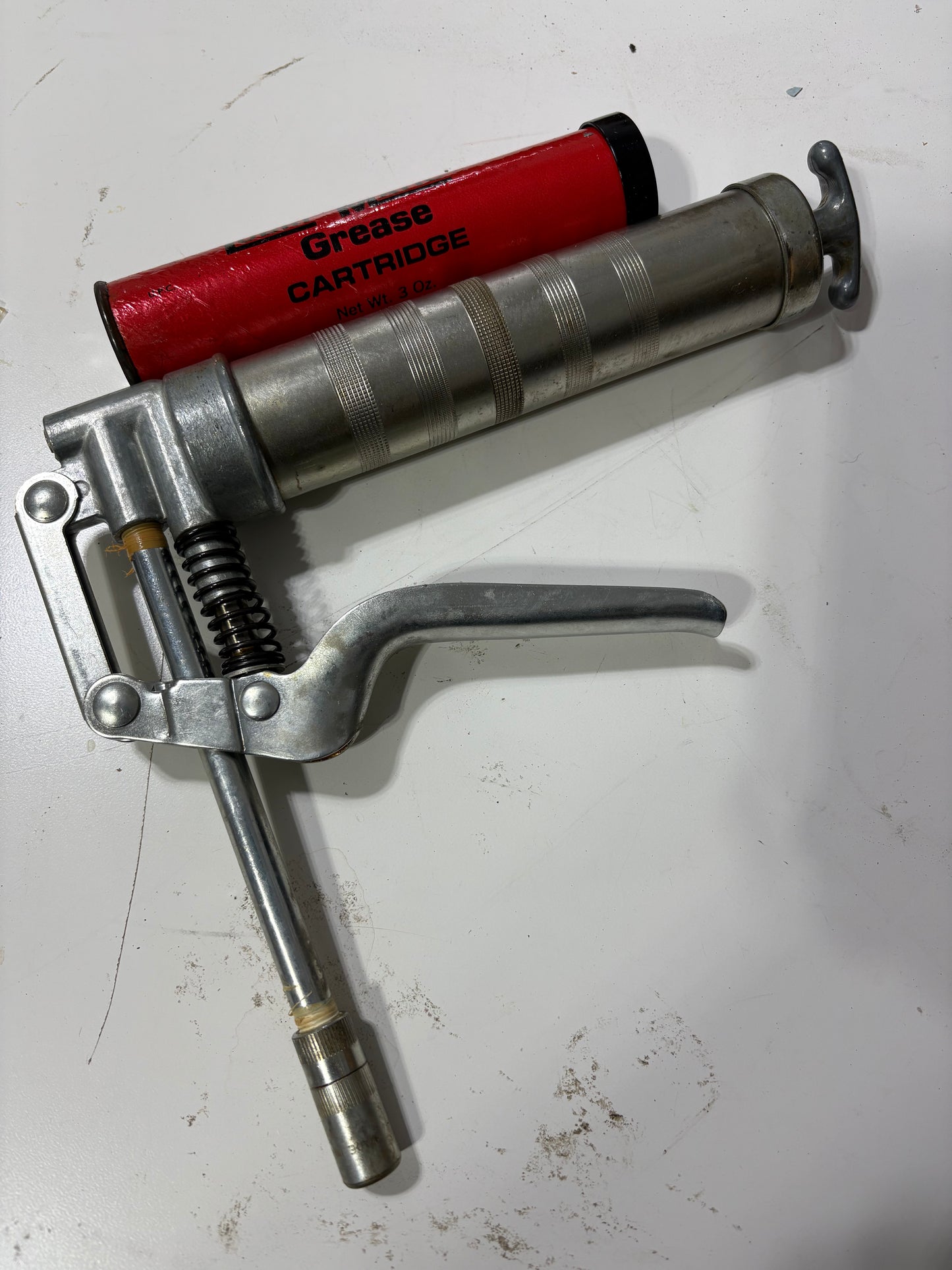 Grease Gun and New Lubri Matic Grease Cartridge