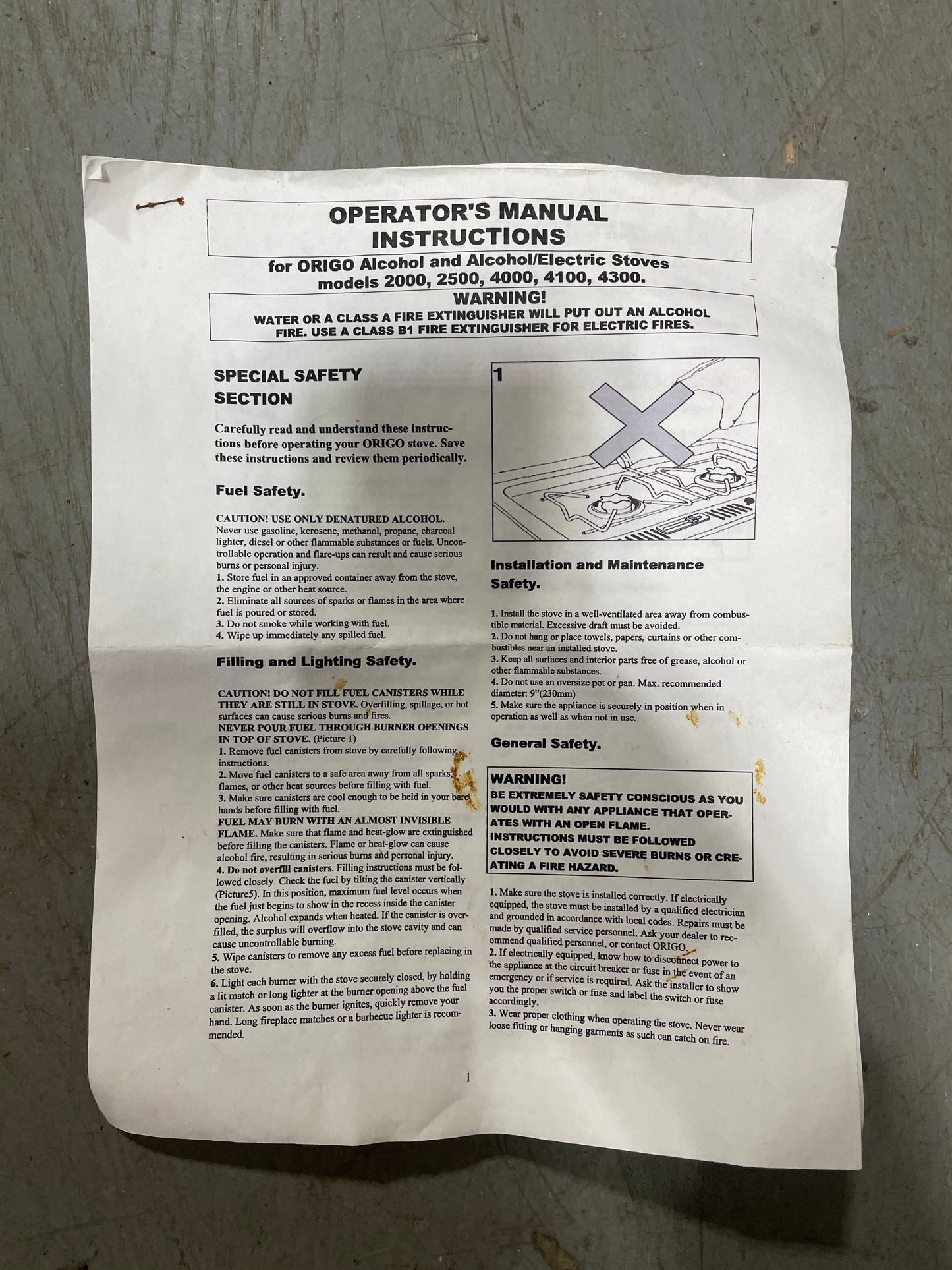 Folded operator's manual on a textured surface