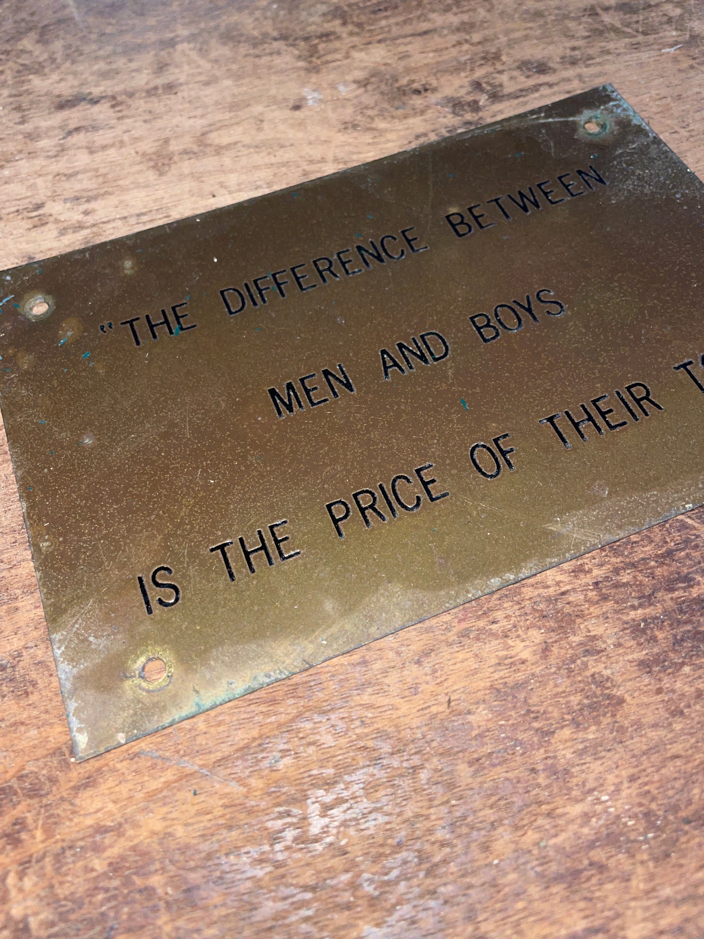 “The Difference Between Men And Boys Is The Price Of Their Toys” Plaque