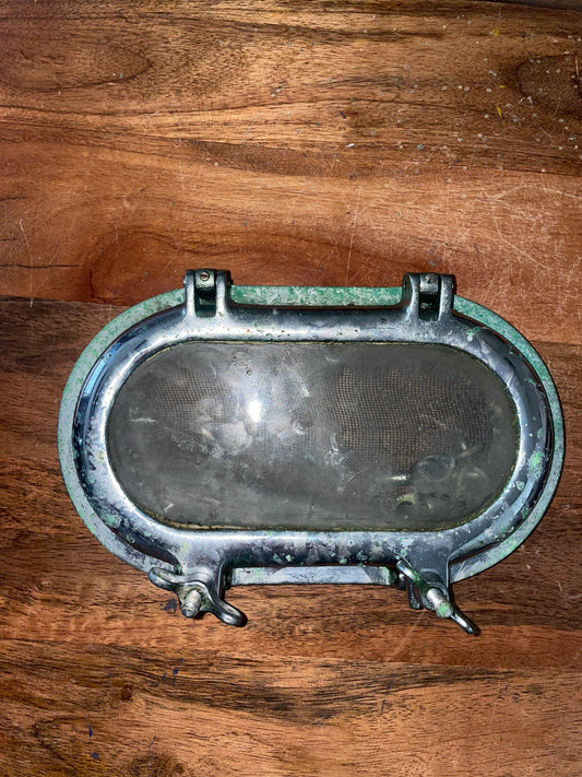 Chromed Bronze Opening Port Light - ID 8” Long x 4 1/8” Wide