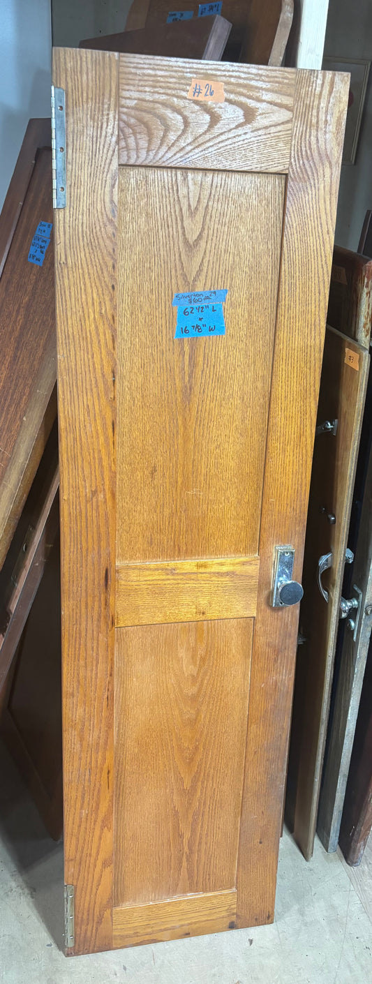 Wooden door with a lock in an indoor setting