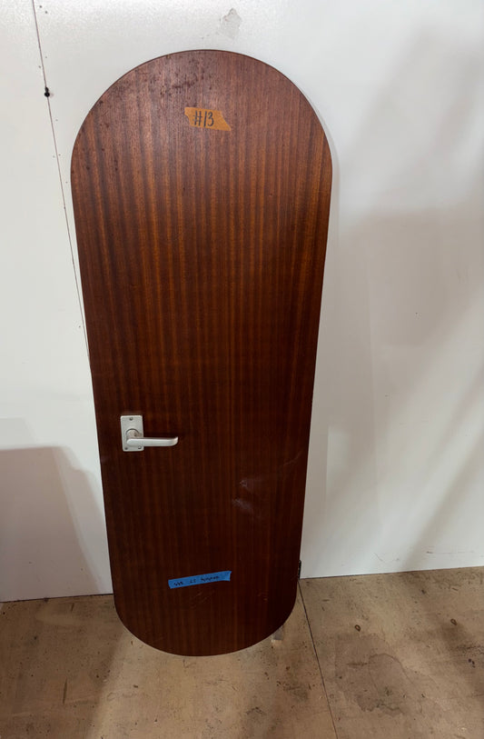 Wooden door with a handle on a white background